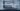 Professional email composition on a laptop screen, business environment, formal tone, elegant and clean workspace, modern office setting, realistic.