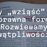 Polish language grammar book with highlighted word 'wziąć', red cross over 'wziąść', educational vibe, realistic.